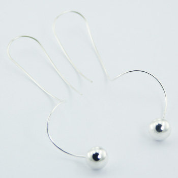 Long twirl silver earrings