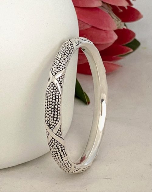 Sterling silver criss cross pattern bangle 10mm wide