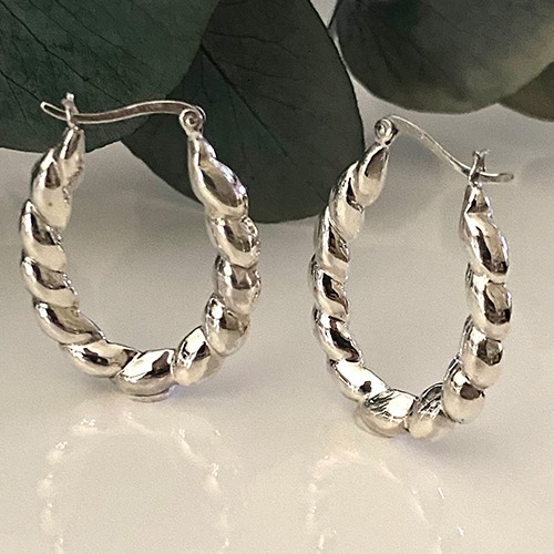 Sterling silver twisted oval hoop earrings
