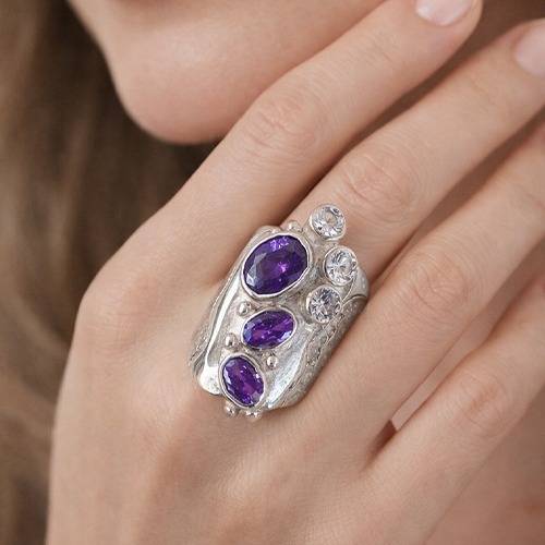Sterling silver Melanie design purple cubic zirconia unique ring 27mm wide