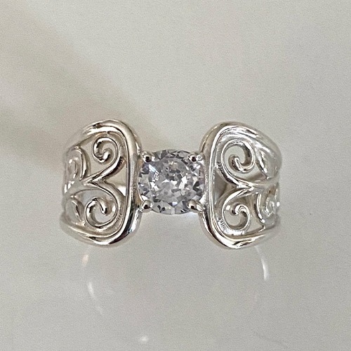Sterling silver fillagree design ring with a simple cubic zirconia stone 11mm wide - Image 4