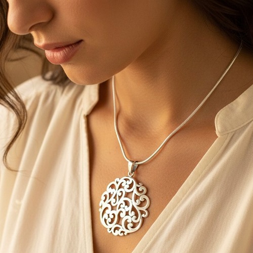 Sterling silver fillagree pattern round pendant 50mm long
