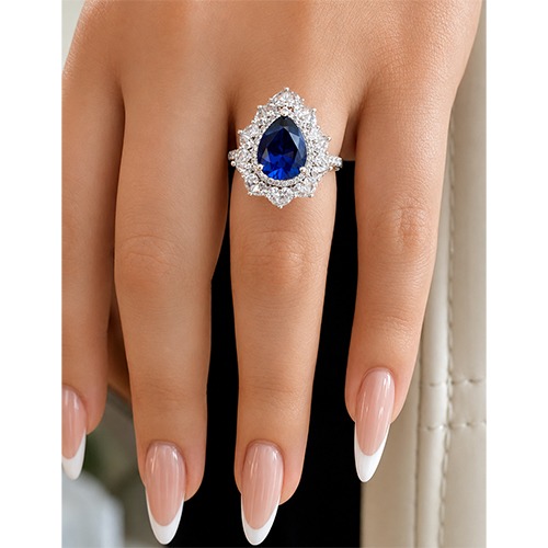 Sterling silver Candice design blue tanzanite teardrop cubic zirconia ring 19mm wide - Image 2