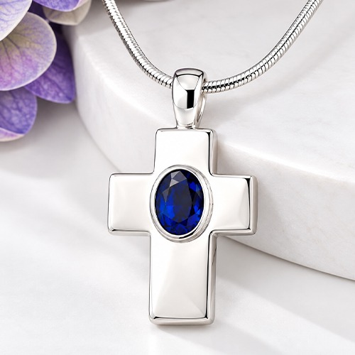Sterling silver classic cross pendant with oval blue cubic zirconia stone 35mm long