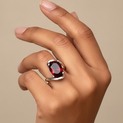 Sterling silver wave design oval red cubic zirconia ring 19mm wide