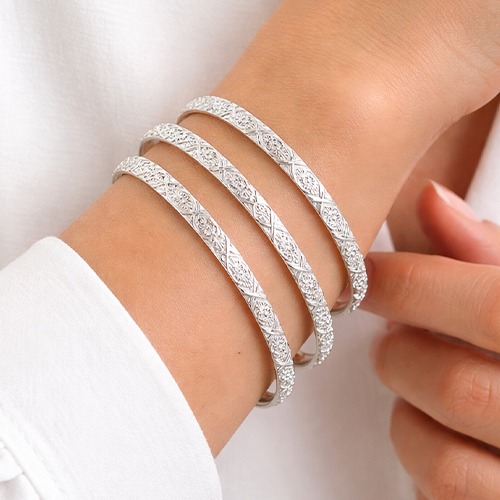Sterling silver ornate flower pattern solid bangle 4mm wide