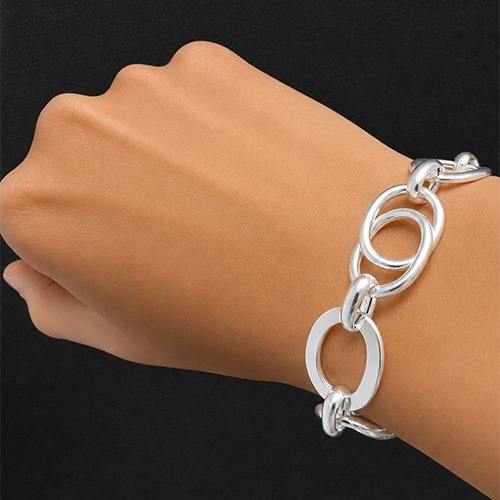Sterling silver twirls oval design solid linked bracelet 17mm wide - Image 2